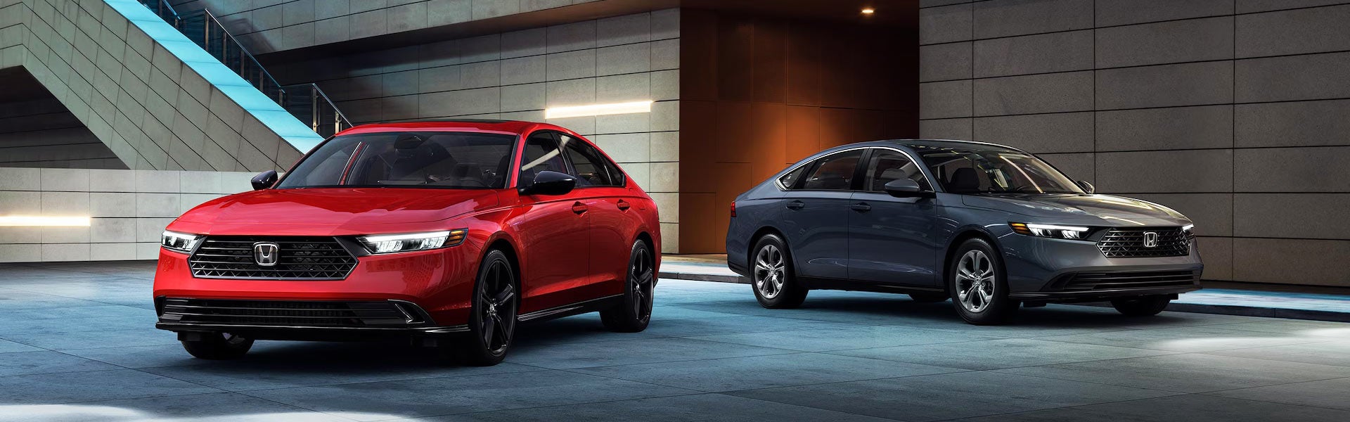 A silver car sitting parked.