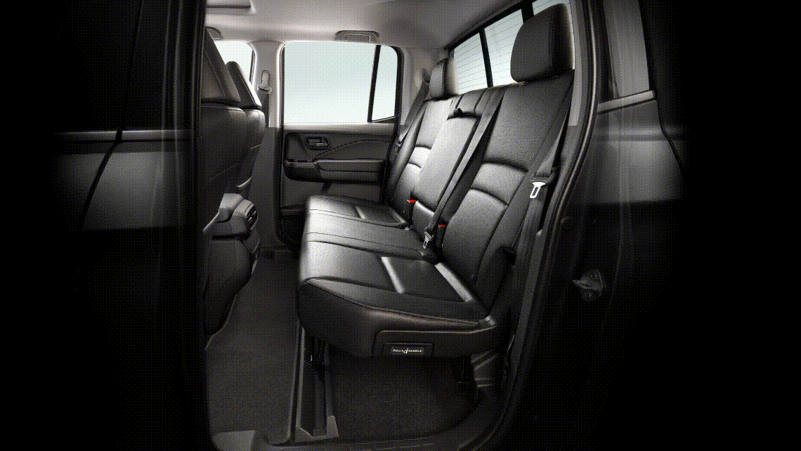 60/40 split lift up rear seating in a 2025 Honda Ridgeline showcasing the extended cargo space.