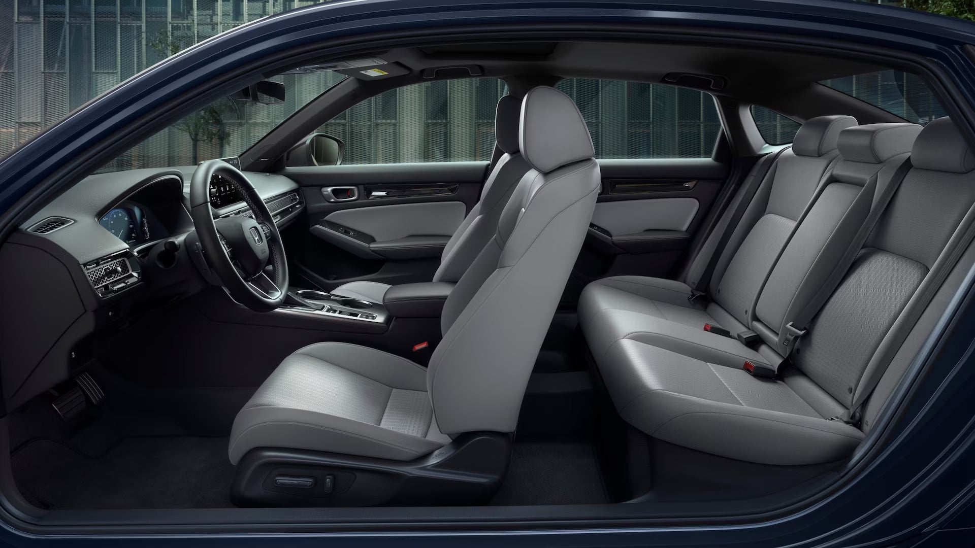 Spacious interior seating of the 2025 Honda Civic with leather upholstery