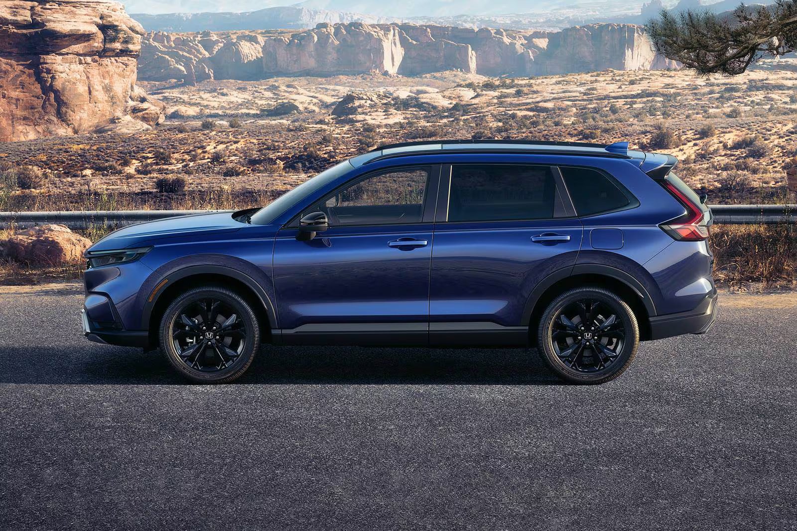 A blue car sitting parked.