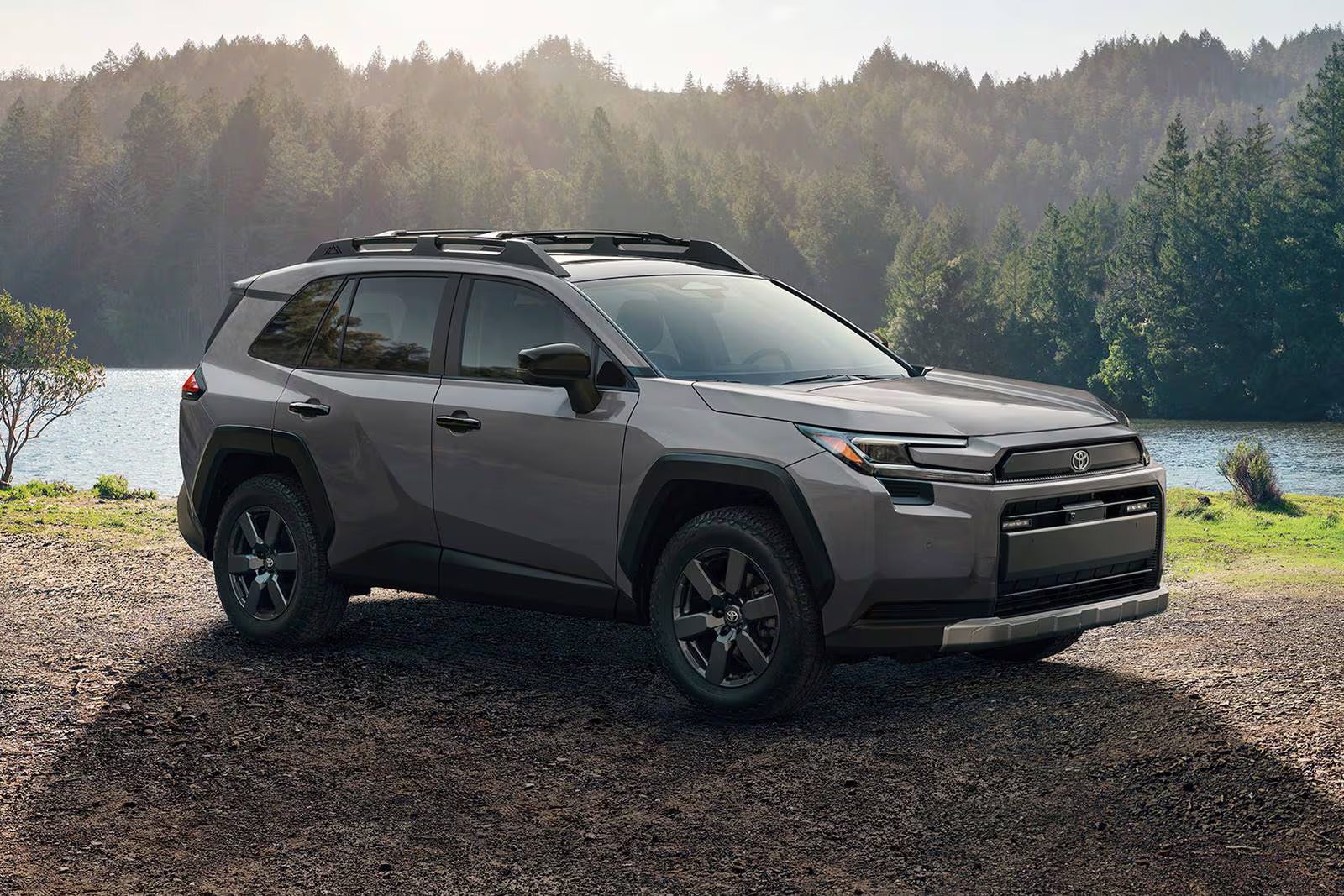 A gray toyota rav 4 sitting parked.