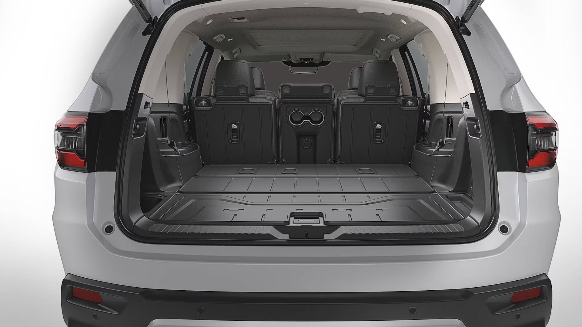 the cargo space of a white suv